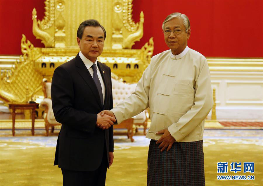 Chinese Foreign Minister Wang Yi meets with Myanmar President Htin Kyaw on April 6, 2016. [Photo: Xinhua]