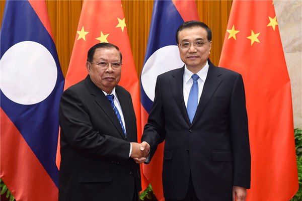 Chinese Premier Li Keqiang met with Lao President Bounnhang Vorachit, who is in Beijing for a three-day visit.