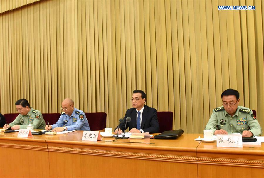BEIJING, May 13, 2016 (Xinhua) -- Chinese Premier Li Keqiang (2nd R) addresses the 7th national conference on people