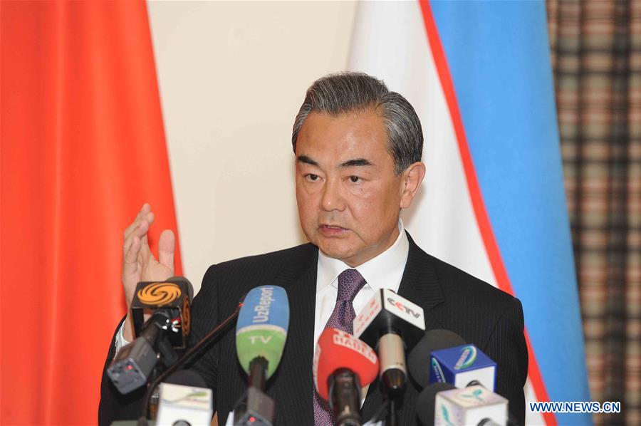 Chinese Foreign Minister Wang Yi addresses reporters after attending a meeting of the Shanghai Cooperation Organization (SCO) foreign ministers in the capital of Uzbekistan on May 24, 2016. The Shanghai Cooperation Organization (SCO) has become a paradigm of global and regional cooperation with great vitality and significant influence since its founding 15 years ago, visiting Chinese Foreign Minister Wang Yi said here Tuesday. (Xinhua/Sadat)
