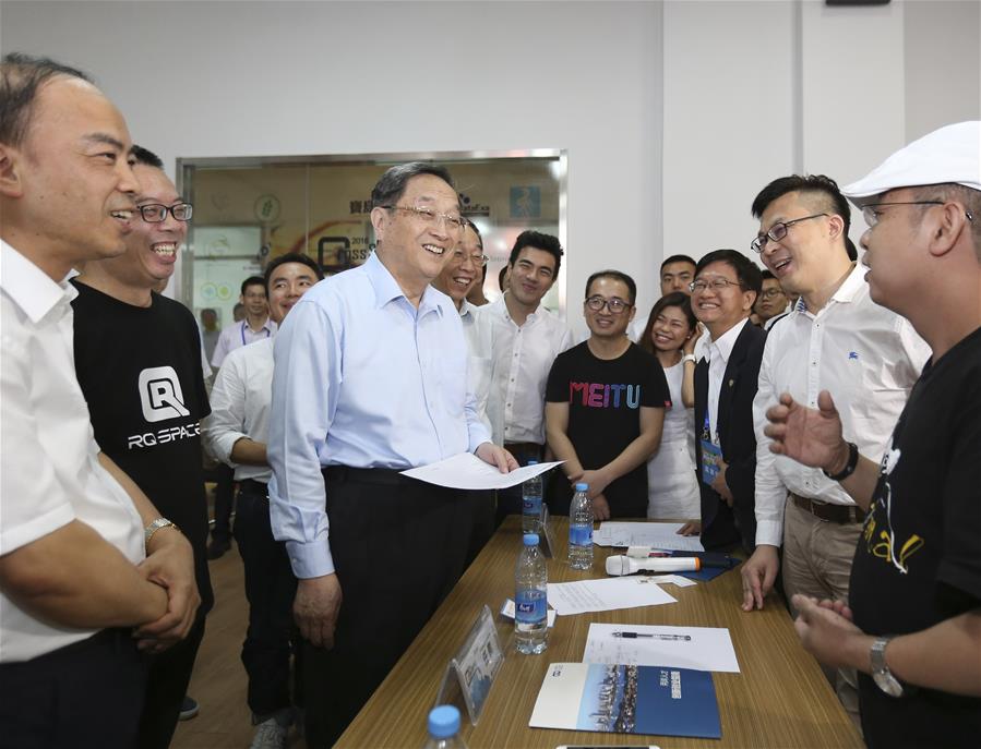 Yu Zhengsheng (3rd L), chairman of the National Committee of the Chinese People