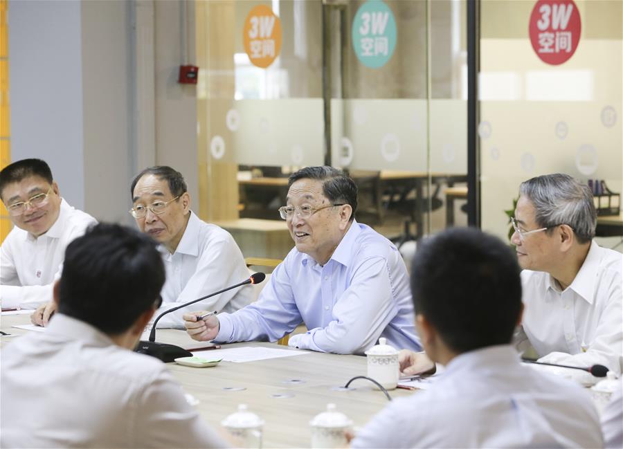  Yu Zhengsheng (C), chairman of the National Committee of the Chinese People