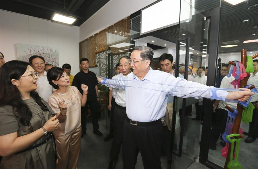  Yu Zhengsheng (2nd L), chairman of the National Committee of the Chinese People