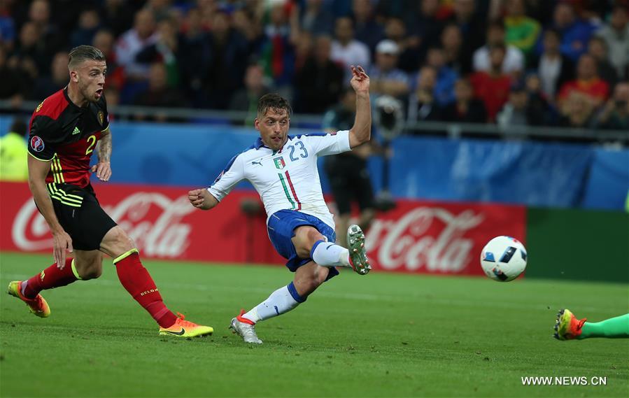 LYON, June 14, 2016 (Xinhua) -- Emanuele Giaccherini (C) of Italy shoots to score during the Euro 2016 Group E soccer match between Belgium and Italy in Lyon, France, June 13, 2016. (Xinhua/Zhang Fan)