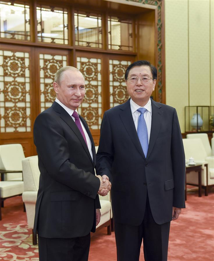 Zhang Dejiang (R), chairman of the Standing Committee of China