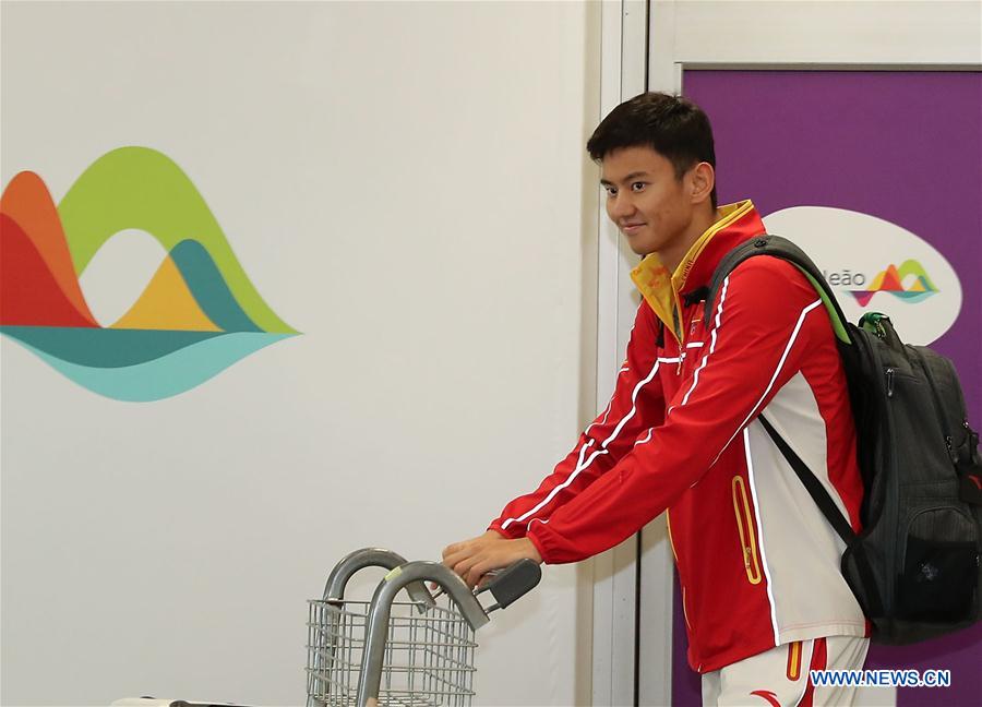 Chinese swimming athlete Ning Zetao arrives at the Galeao International Airport in Rio de Janeiro, Brazil, on July 31, 2016. The members of Chinese national swimming team arrived at Rio de Janeiro on Sunday. (Xinhua/Cao Can) 