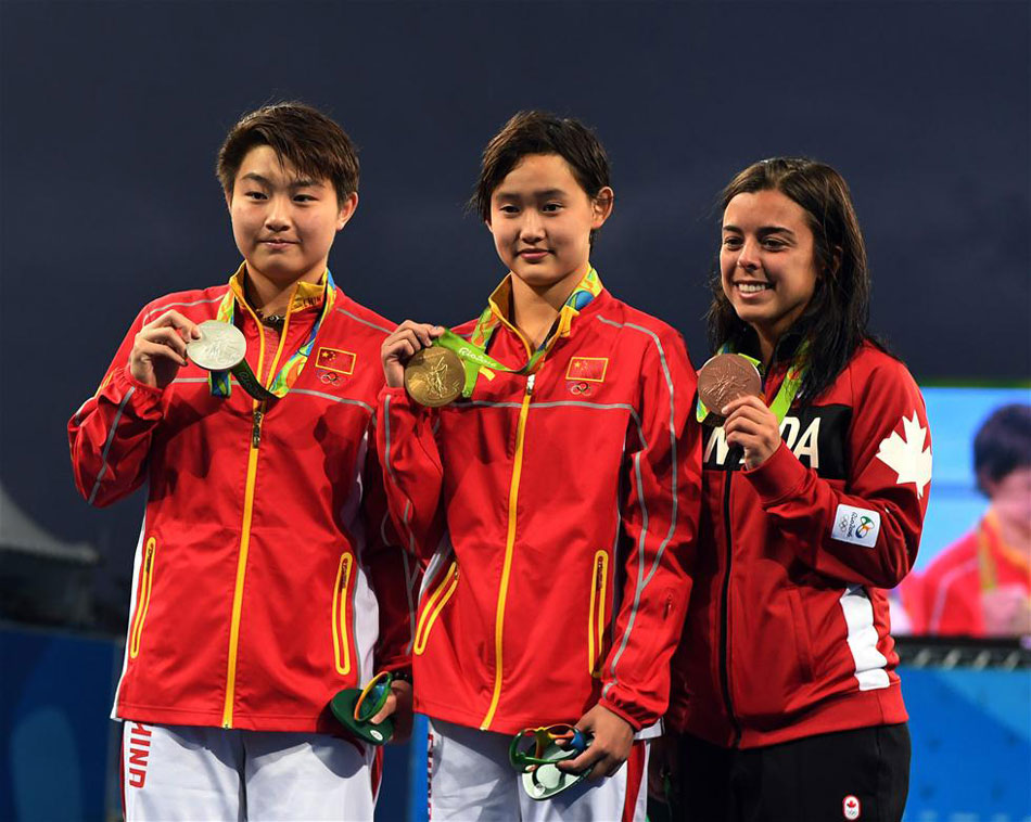 Teenage diver Ren Qian became the youngest gold medallist at the Rio Olympics by winning the 10m platform final on Thursday, Aug. 18, 2016. [Photo: Xinhua] 