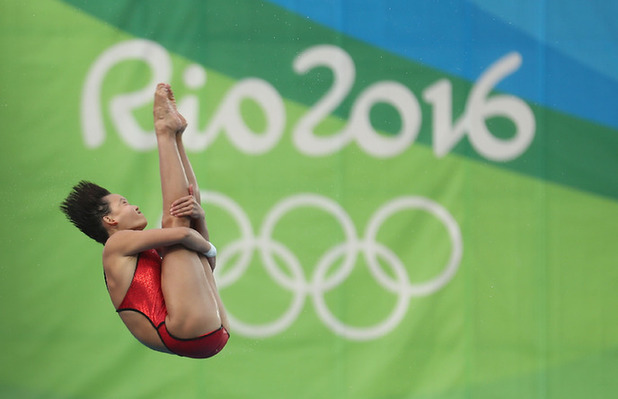 Ren Qian competes during the women