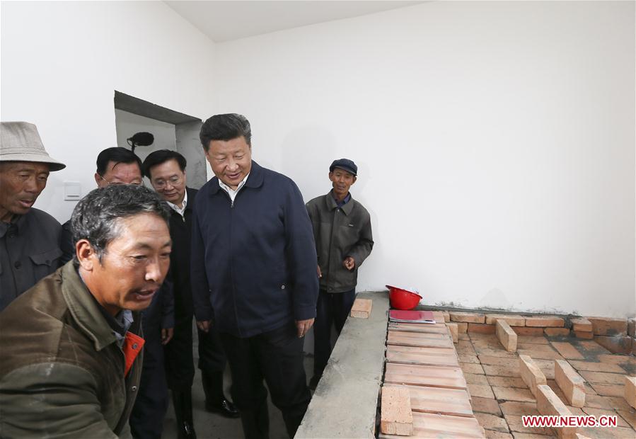 Chinese President Xi Jinping visits the new house of villager Lyu Youzhang in Wushi Township of Huzhu Tu Autonomous County in Haidong, northwest China