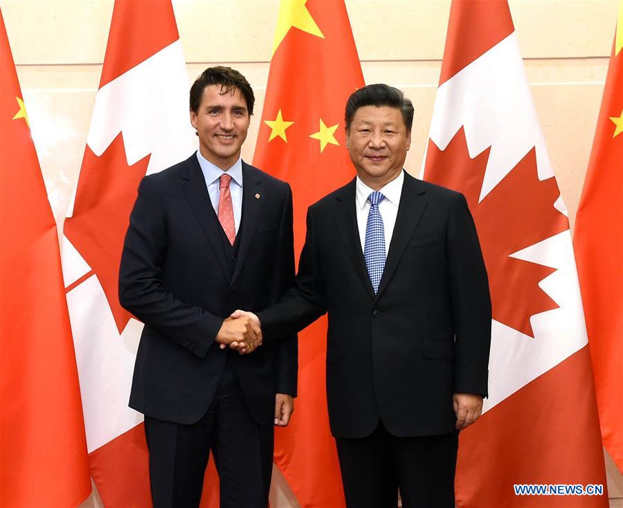 Chinese President Xi Jinping (R) meets with Canadian Prime Minister Justin Trudeau in Beijing, capital of China, Aug. 31, 2016. (Xinhua/Rao Aimin)