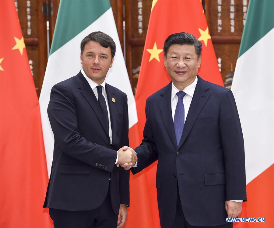 Chinese President Xi Jinping (R) meets with Italian Prime Minister Matteo Renzi in Hangzhou, capital city of east China