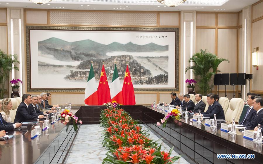 Chinese President Xi Jinping (3rd R) meets with Italian Prime Minister Matteo Renzi in Hangzhou, capital city of east China