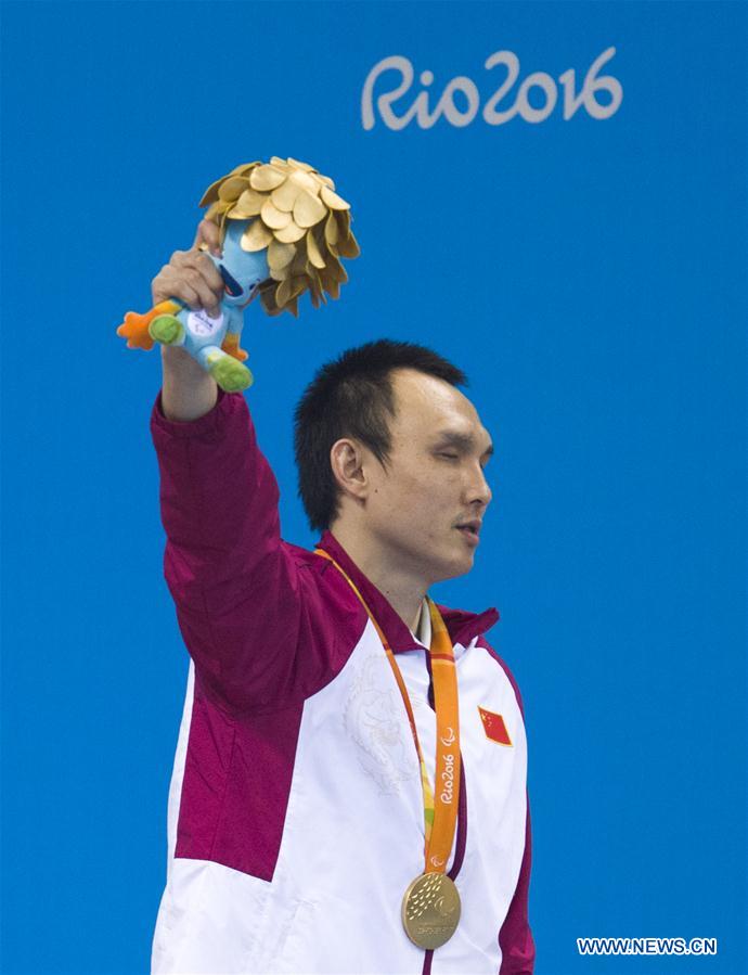 Yang Bozun of China reacts during the awarding ceremony of the men