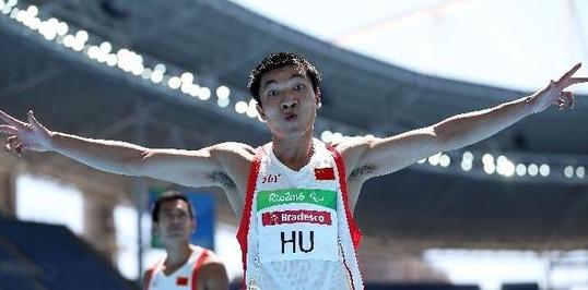 Hu Jianwen celebrates after winning the men