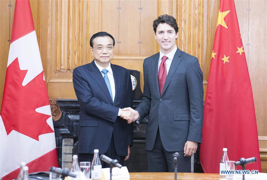 Chinese Premier Li Keqiang (L) holds talks with his Canadian counterpart Justin Trudeau in Ottawa, Canada, Sept. 22, 2016. (Xinhua/Huang Jingwen)
