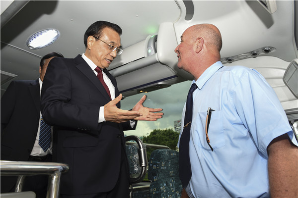 Li Keqiang has highlighted the importance of maintaining the quality of exports to Cuba by riding a China-made bus in the capital Havana.