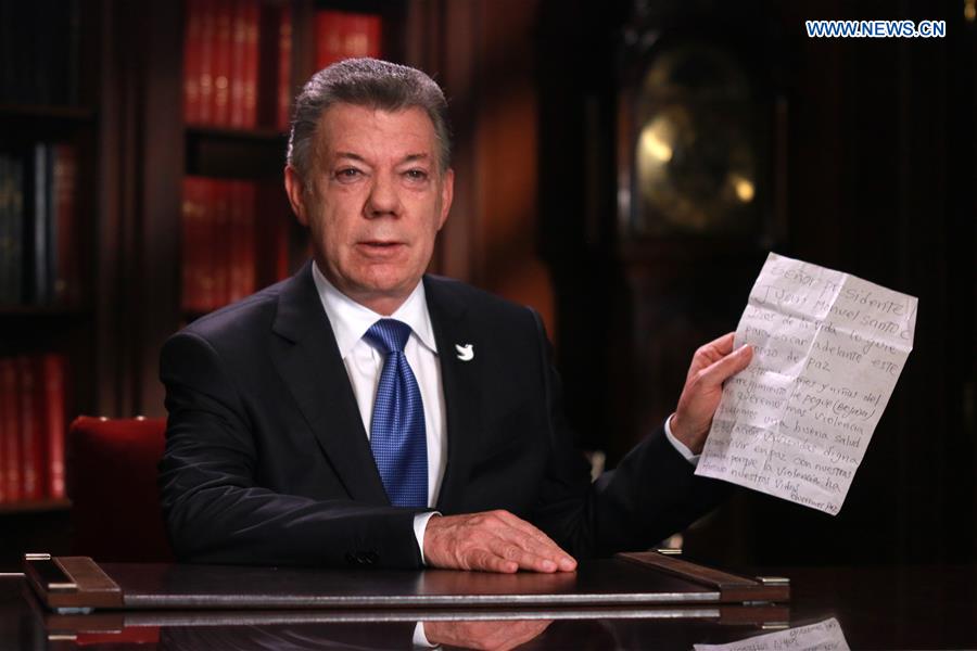 Image provided by the Colombian Presidency shows Colombian President Juan Manuel Santos making a statement in Bogota, Colombia, Oct. 10, 2016. The Colombian government and the National Liberation Army (ELN), the country