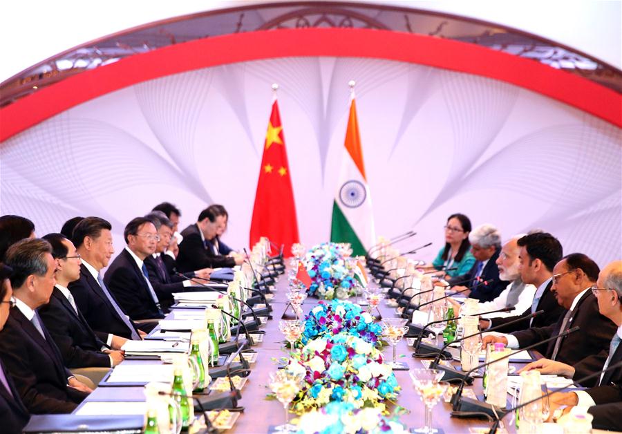 Chinese President Xi Jinping meets with Indian Prime Minister Narendra Modi in the western Indian state of Goa, Oct. 15, 2016. (Xinhua/Ding Lin) (zhs)