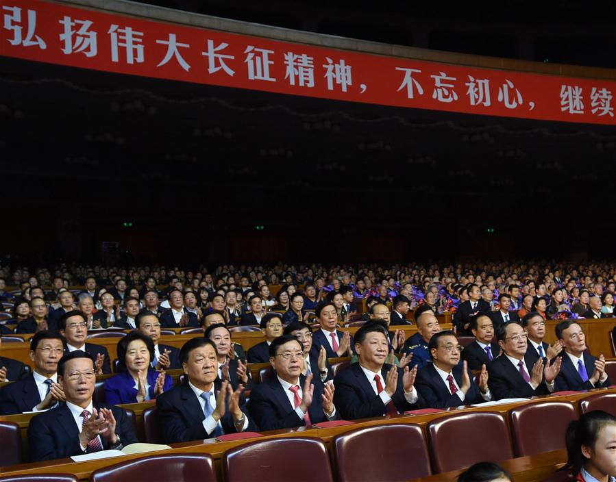 Chinese President Xi Jinping and other senior leaders Li Keqiang, Zhang Dejiang, Yu Zhengsheng, Liu Yunshan, Wang Qishan and Zhang Gaoli watch a gala commemorating the 80th anniversary of the victory of the Long March in Beijing, capital of China, Oct. 19, 2016. (Xinhua/Rao Aimin)