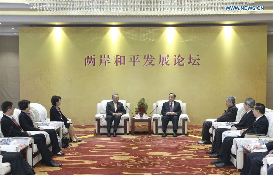 Yu Zhengsheng (R, rear), chairman of the National Committee of the Chinese People
