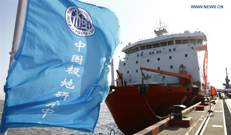 Team members of research vessel and icebreaker Xuelong (Snow Dragon) say goodbye at a Shanghai dock, east China, Nov. 2, 2016. China launched its 33rd Antarctic expedition when Xuelong left a Shanghai dock Wednesday morning. (Xinhua/Fang Zhe)