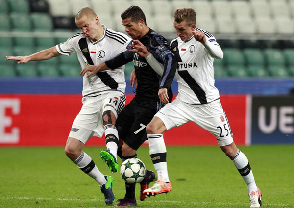  Legia Warszawa and Real Madrid played out a six-goal thriller as the spoils were shared in their UEFA Champions League Group F encounter.