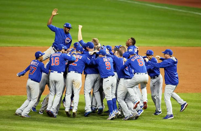 IMAGE: Chicago Cubs players celebrate after defeating the Cleveland Indians in game seven of the 2016 World Series at Progressive Field in Cleveland, Ohio on Wednesday. Photograph: Charles LeClaire-USA TODAY Sports via Reuters 