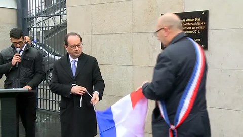 French President Francois Hollande unveils plaques at the sites of the Paris attacks at the city marks the first anniversary. Rough cut 