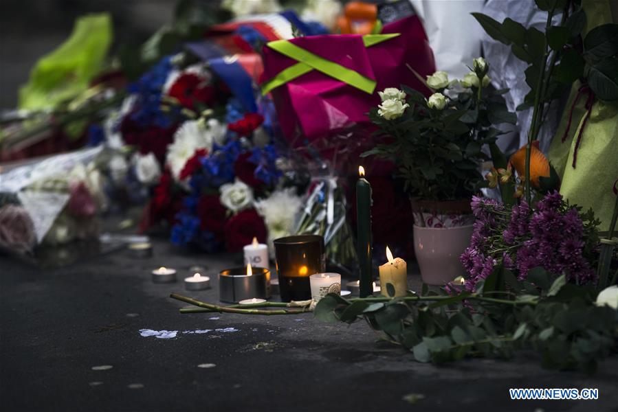 Photo taken on Nov. 13, 2016 show candles lit up during a ceremony to commemorate the one year anniversary of the terrorist attacks in Pairs, France, Nov. 13, 2016. French President Francois Hollande opened a national day of commemoration one year after the terror attacks hit Paris. Commemorations were held on Sunday in the city at the places of the attacks which killed 130 people. (Xinhua/Thierry Mahe)