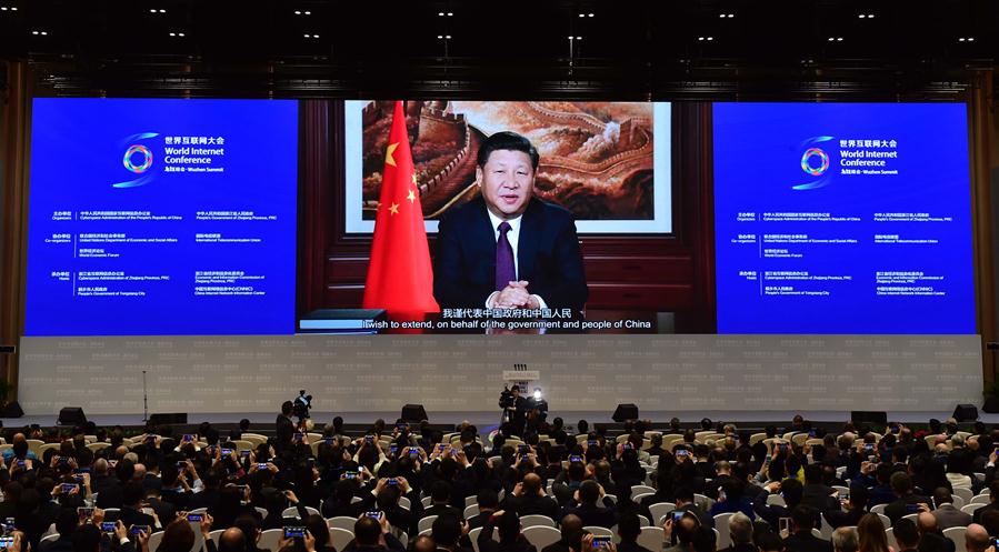 Chinese President Xi Jinping gives a speech via video at the opening ceremony of the third World Internet Conference (WIC) in Wuzhen, east China