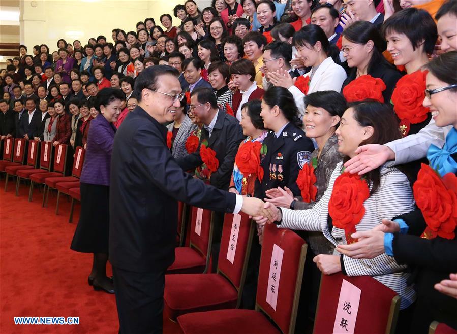 Chinese Premier Li Keqiang (front) attends the sixth national working conference on women and children in Beijing, capital of China, Nov. 18, 2016. (Xinhua/Liu Weibing)