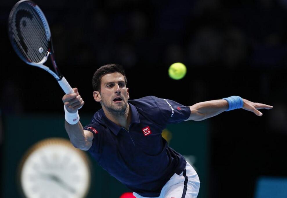 Novak Djokovic of Serbia returns the ball during the singles semifinal with Kei Nishikori of Japan at the 2016 ATP World Tour Finals at the O2 Arena in London, Britain on Nov. 19, 2016. Djokovic won 2-0. (Xinhua/Han Yan)