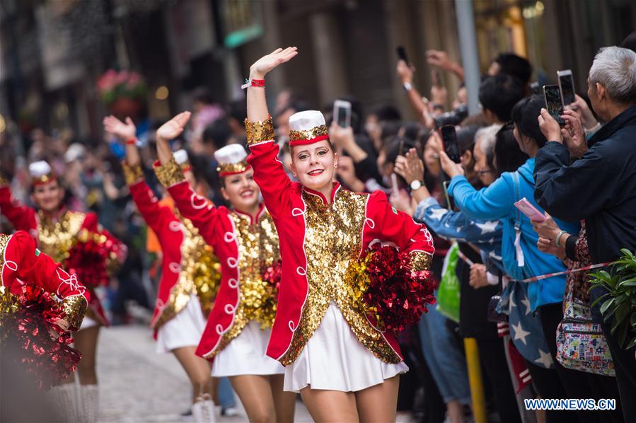Actresses take part in the "Parade through Macao, Latin City" in Macao, south China, Dec. 4, 2016. The parade was held here on Sunday to mark the 17th anniversary of Macao