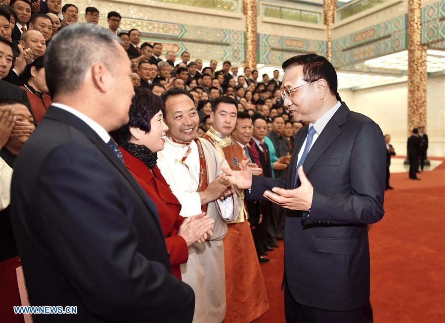 Chinese Premier Li Keqiang meets with representatives of China