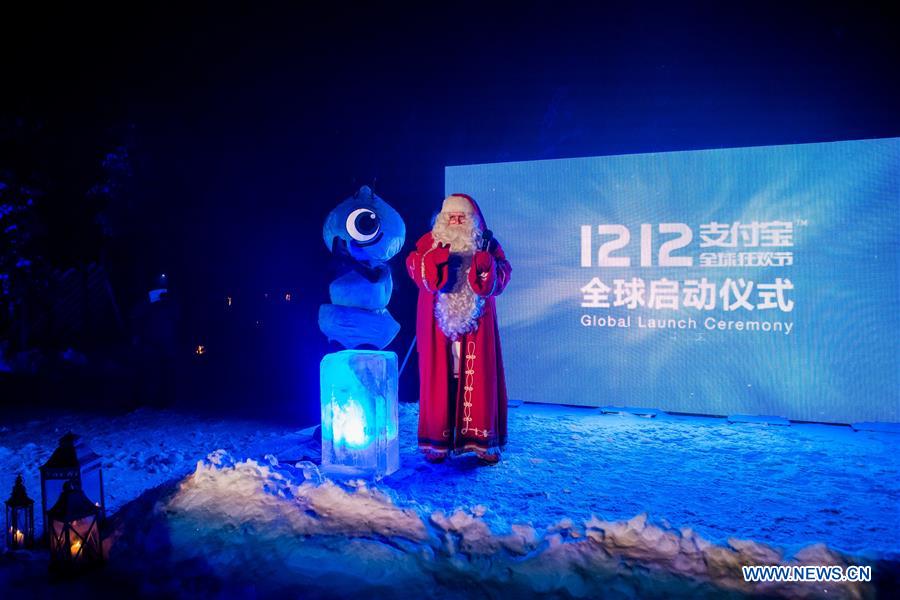 A ceremony is held at Santa Village to activate the global campaign of Alipay 1212 in Rovaniemi, Finland, Dec. 5, 2016. Alipay, the payment service of China