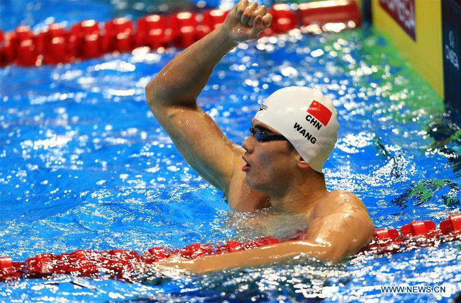 Wang Shun of China celebrates vicotry after the Men