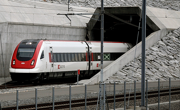 A passenger train of Swiss railway operator SBB leaves the northern gates of the NEAT Gotthard Base Tunnel, the world