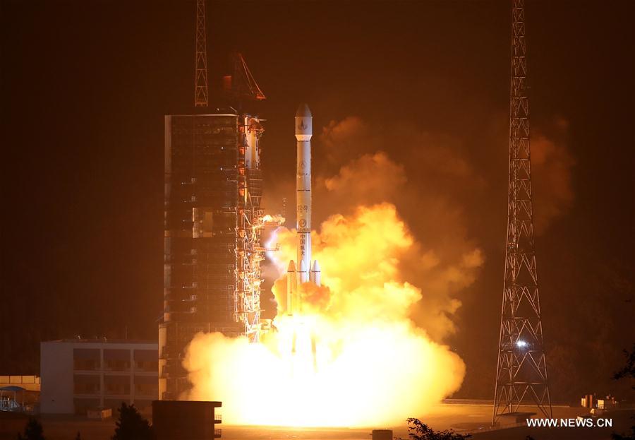 A Long March-3B rocket carrying the Fengyun-4 satellite blasts off from the launching pad at Xichang Satellite Launch Center, southwest China