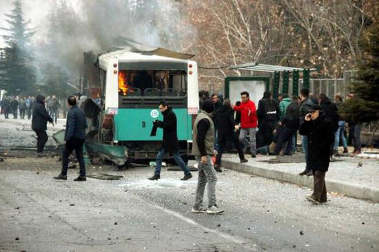 A suicide car bombing has killed 14 soldiers and wounded dozens more in the central city of Kayseri of Turkey. 