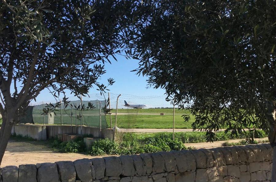 Photo taken on Dec. 23, 2016 shows the hijacked Libyan plane at Malta International Airport, Valletta, Malta. A hijacked Libyan airplane which was diverted to Malta on Friday has 111 passengers on board, 82 males, 28 females, and one infant, Malta Prime Minister Joseph Muscat said on Twitter. (Xinhua/Jacob Borg)