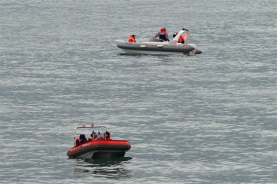 Photo taken on Dec. 25, 2016 shows the rescue operation on the Black Sea coast at the crash site of Russian Defense Ministry