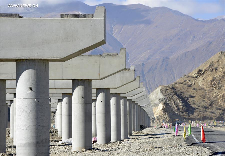 Photo taken on Jan. 6, 2017 shows the bridge construction site of the south section of a ring road near the Potala Palace in Lhasa, capital of southwest China