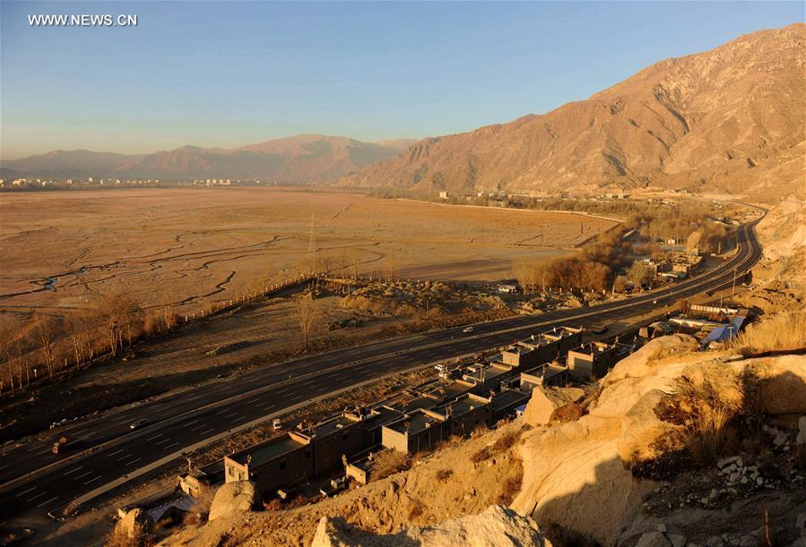 Photo taken on Jan. 6, 2017 shows the bridge construction site of the south section of a ring road near the Potala Palace in Lhasa, capital of southwest China
