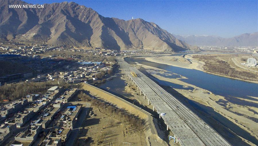 Photo taken on Jan. 6, 2017 shows the bridge construction site of the south section of a ring road near the Potala Palace in Lhasa, capital of southwest China