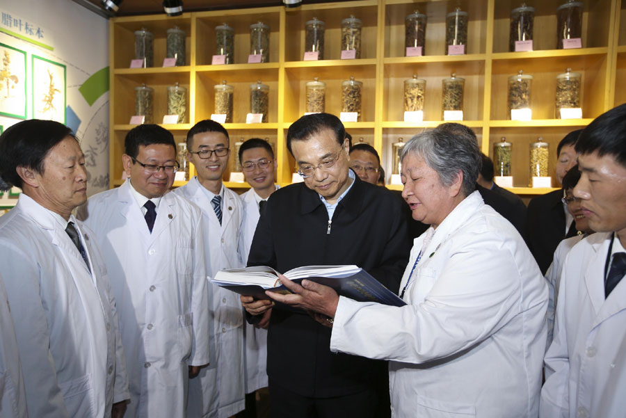Chinese Premier Li Keqiang visits Yunnan Baiyao Group on Tuesday, January 24, 2017, in Kunming, southwest China