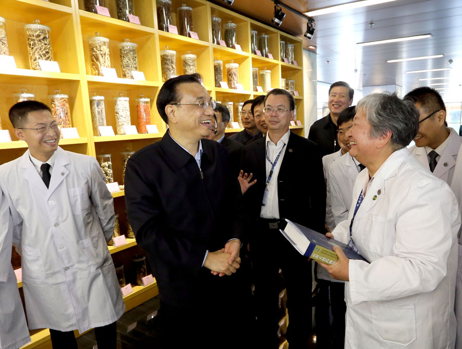Chinese Premier Li Keqiang visits Yunnan Baiyao Group on Tuesday, January 24, 2017, in Kunming, southwest China