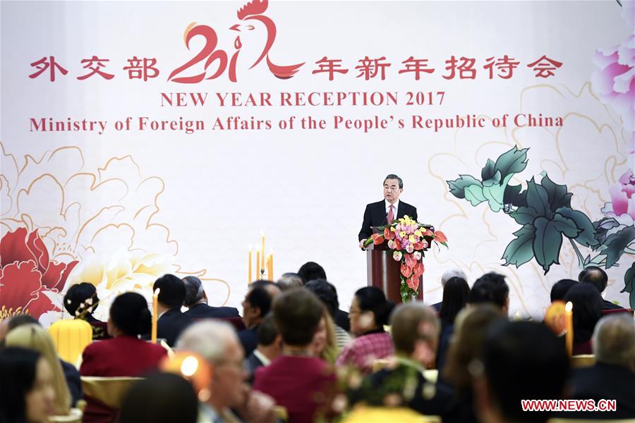 Chinese Foreign Minister Wang Yi addresses a new year reception held by the Chinese Ministry of Foreign Affairs for foreign diplomats and representatives of international organizations in Beijing, capital of China, Jan. 24, 2017. (Xinhua/Zhang Ling)