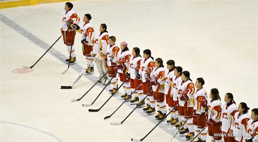 Players of China line up during the national anthem ceremony ahead of the women