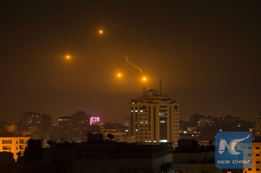 Flares are seen over Gaza City on February 6, 2017. Israel struck a number of Hamas positions in Gaza after a "projectile" fired from the Palestinian enclave crashed in a border area, the Israeli army said. (Xinhua/AFP Photo)