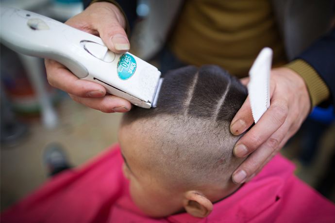 Having haircuts for good luck